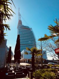 Low angle view of modern buildings against sky