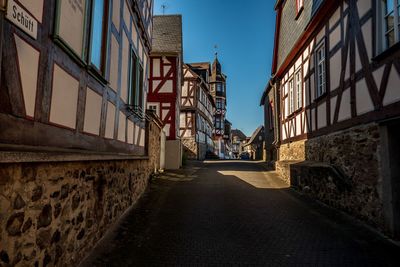 Narrow alley along buildings