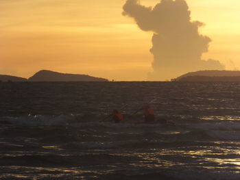 Scenic view of sea at sunset