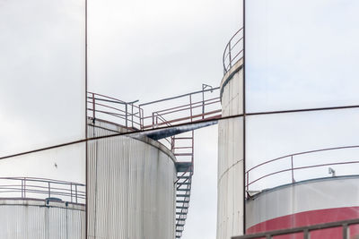 Low angle view of industrial building against sky