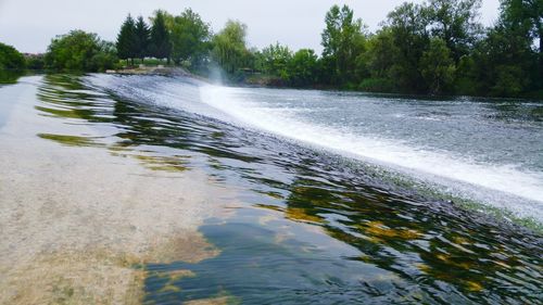 View of water flowing through rocks