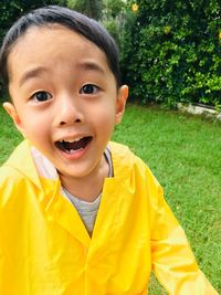 Portrait of cute boy in yard