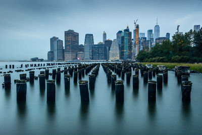 Panoramic view of river and buildings against sky