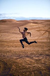 Man jumping in the sea