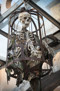 Low angle view of clock on metal structure