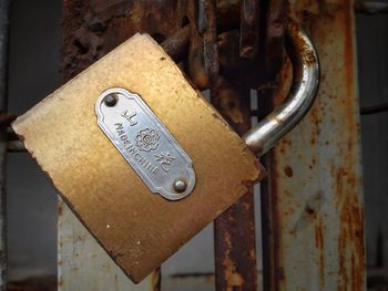 Close-up of padlock on door