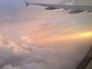 Low angle view of airplane flying in sky