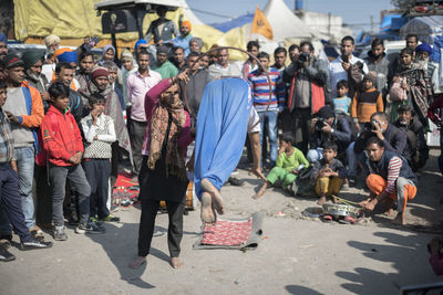 People on street in city