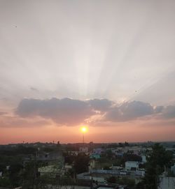 High angle view of townscape against sky during sunset