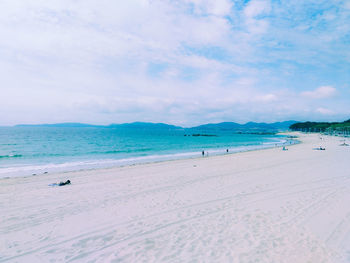 Scenic view of beach against sky