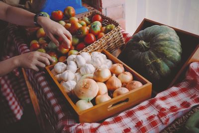 Man with vegetables in basket