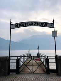 Bridge over sea against sky