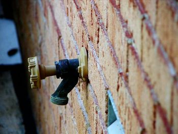 Faucet attached on wall