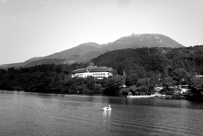 Scenic view of lake with mountains in background