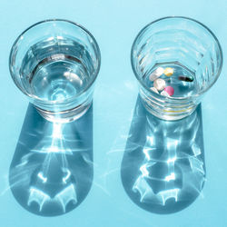 High angle view of glass of water on table