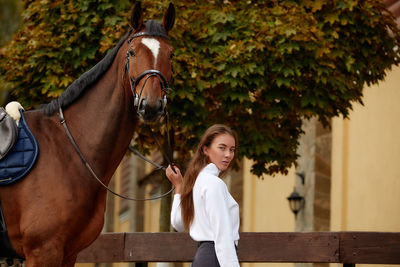 Full length of man riding horse