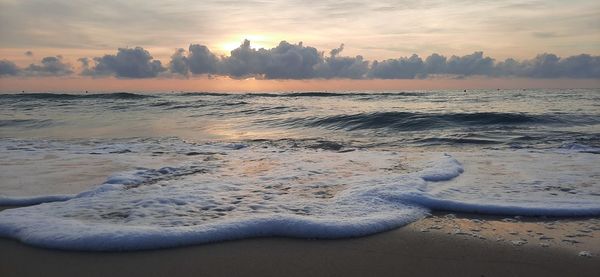 Scenic view of sea against sky during sunset