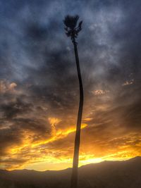 Scenic view of landscape against sky at sunset