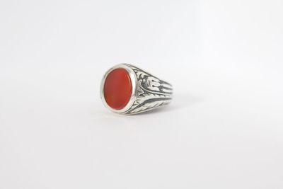 Close up of ring over white background