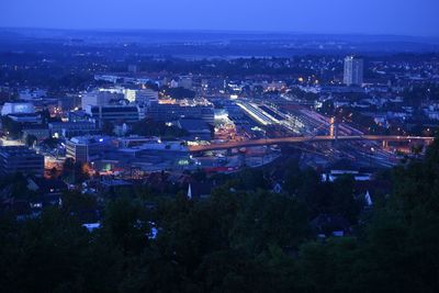 Aerial view of illuminated cityscape at night