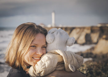 Portrait of smiling woman outdoors