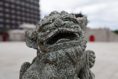 Close-up of statue against sky