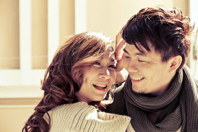 Close-up of smiling couple