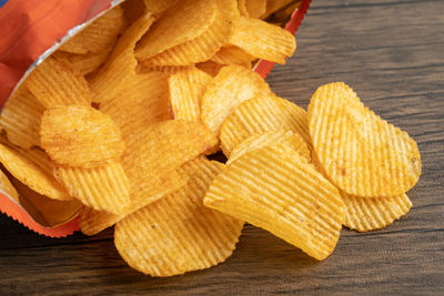 Potato chips, delicious bbq seasoning spicy for crips, thin slice deep fried snack fast food 