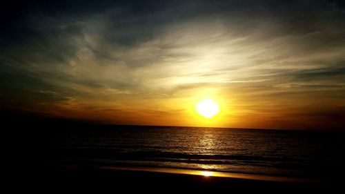 Scenic view of sea at sunset