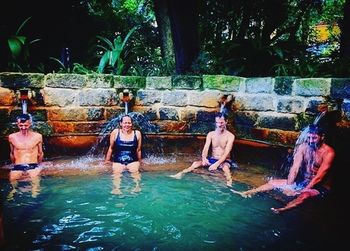 People enjoying in swimming pool