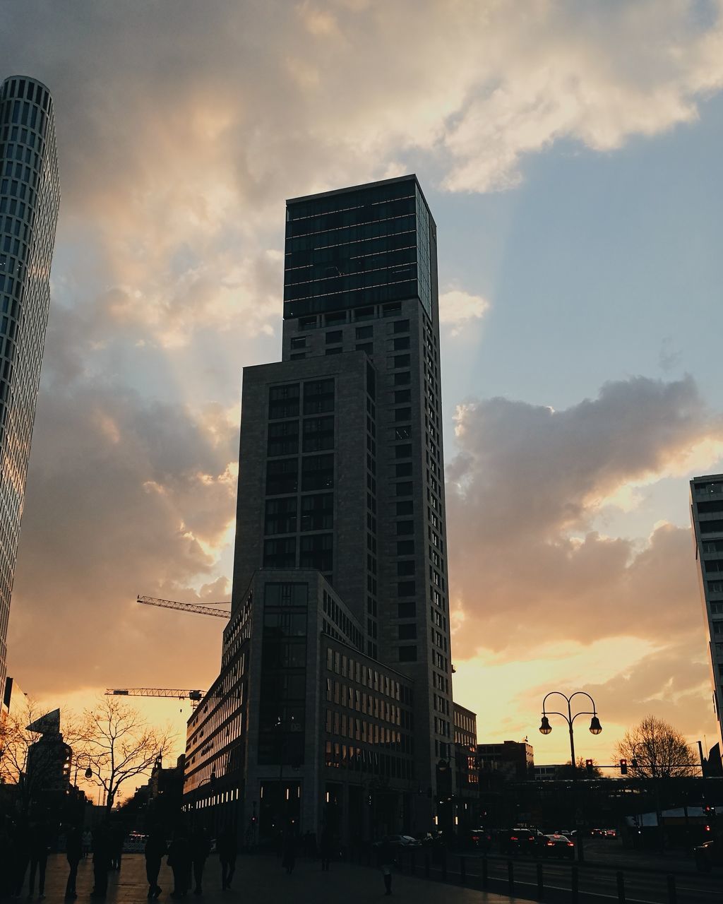 sunset, architecture, cloud - sky, sky, city, building exterior, built structure, skyscraper, modern, outdoors, city life, cityscape, no people, day