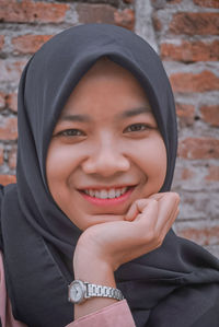 Portrait of a smiling young woman