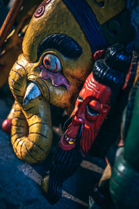 Close-up of statues for sale 