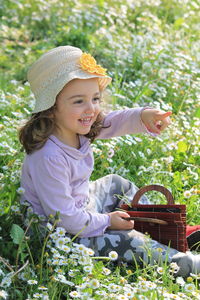 Portrait of smiling girl with plants
