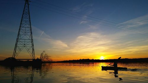 Scenic view of sunset over river