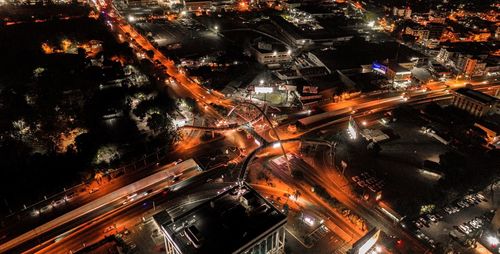 High angle view of illuminated city at night