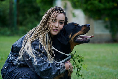 Portrait of woman with dog