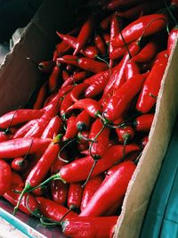 High angle view of red chili peppers for sale at market