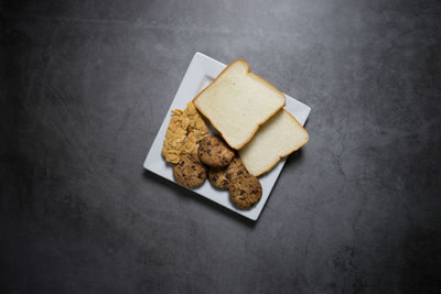 High angle view of cookies in plate on table
