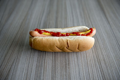Close-up of hot dog on table