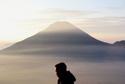 Scenic view of mountain against sky during sunset