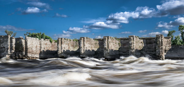 Panoramic view of sea against cloudy sky