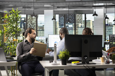 Business colleagues working at office