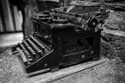 Close-up of old typewriter on table