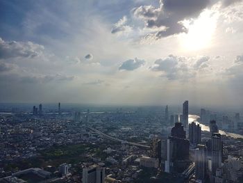 High angle view of city buildings against sky