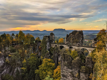 Scenic view of mountain against cloudy sky