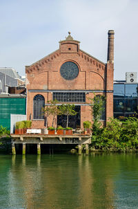 Old monumental warehouse on persoonshaven harbour, converted to office