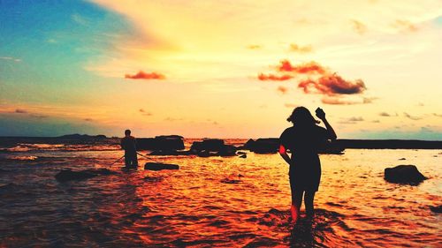 Scenic view of sea at sunset