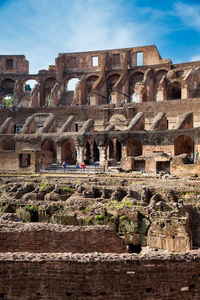 View of the seating areas and the hypogeum of the ancient colosseum in rome