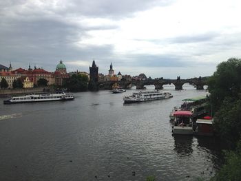 View of bridge over river against buildings